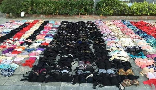 ���ţ�����͵2000��Ů�����²����컨���ϣ��컨����ѹ��