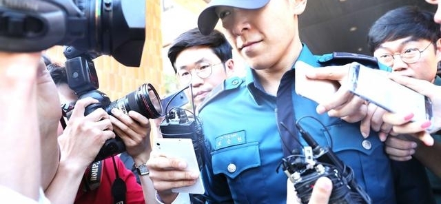 T.O.P�����ҩ������Ժ YG���֣�������δ�ָ���ʶ��