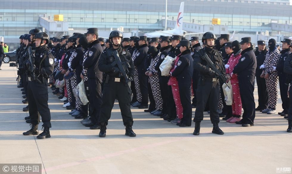 陕西破获跨国电信诈骗案 63名嫌犯被押回国