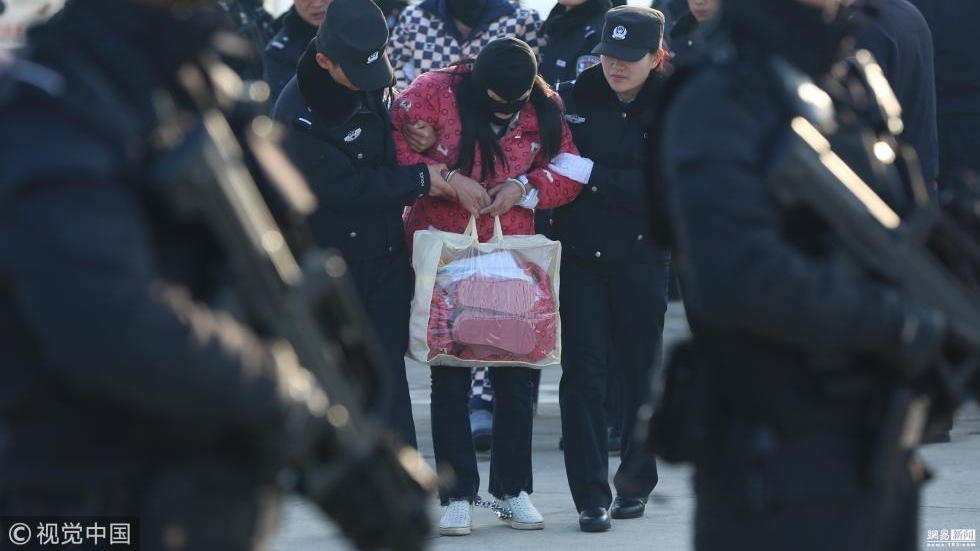 陕西破获跨国电信诈骗案 63名嫌犯被押回国