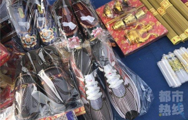 清明节祭品“赶时髦” 有吃有住还包洗护