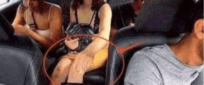 两男一女打车坐在后排,一女子居然将手伸进那里,车上监控拍下全过程