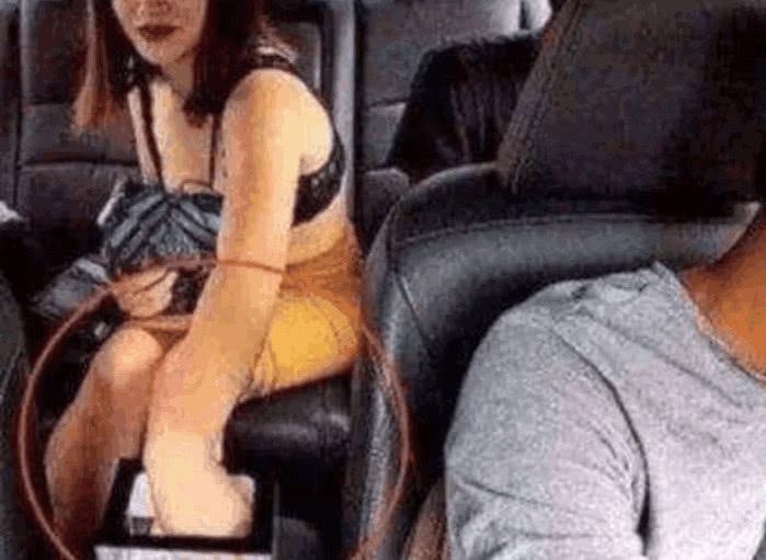 两男一女打车坐在后排,一女子居然将手伸进那里,车上监控拍下全过程