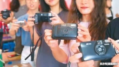 �ĸ￪��40��� �й��˶���Ʒ�����ѵ���ʶ������ϵ�б�Ǩ