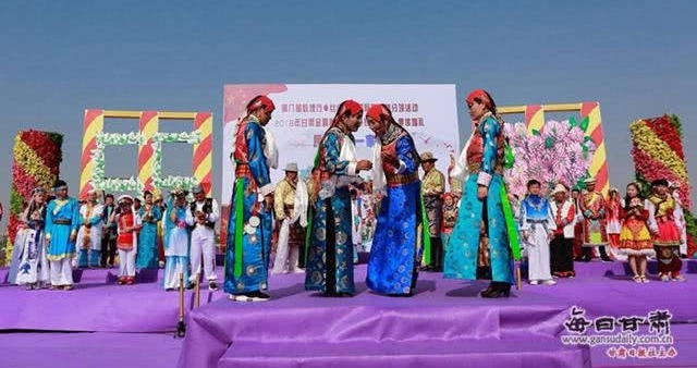 金昌举办少数民族集体婚礼 56对新人薰衣草花海定终身