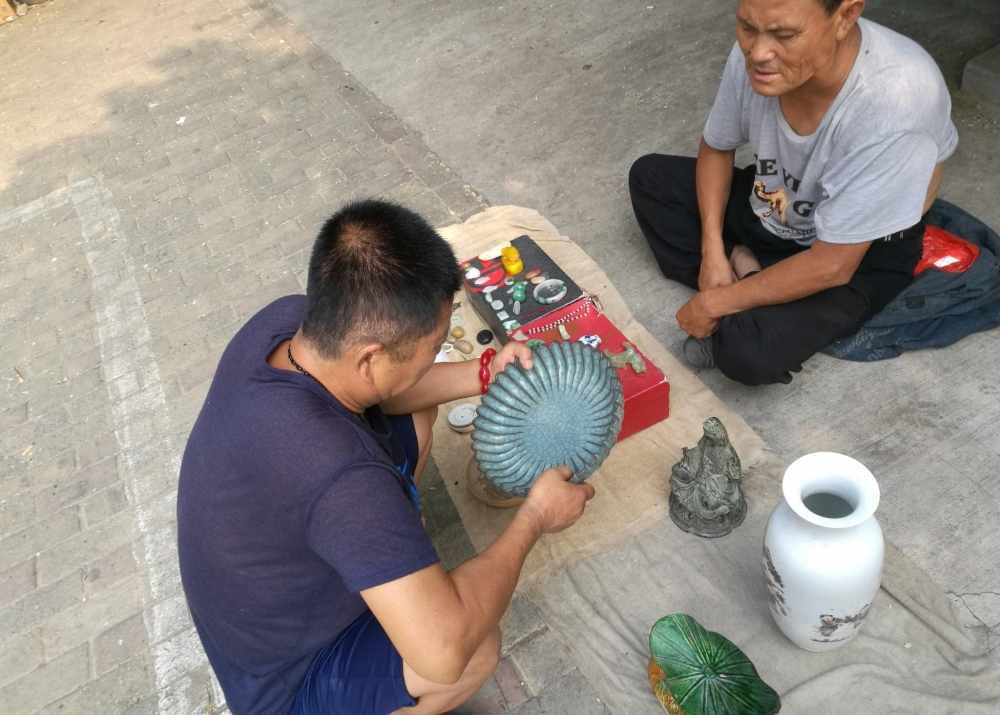 �ھӴ����ڹ����г����ջ�һ������̣�̯����������������δ���