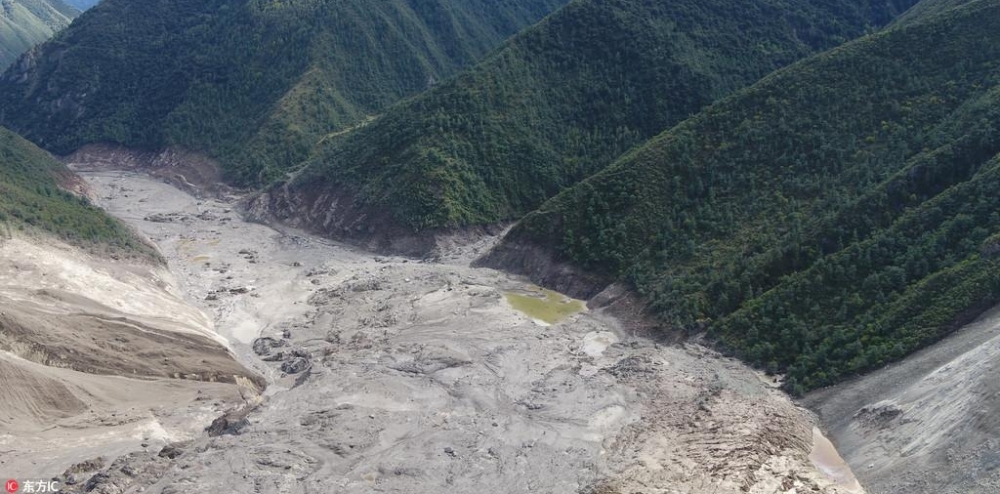 直击现场:金沙江泥石流堰塞湖已自然疏通